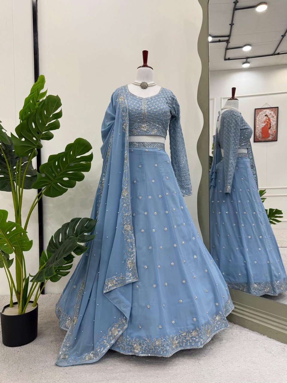 Astonishing Wedding Wear Blue Color Thread And Sequence Work Faux Georgette Lehenga Choli