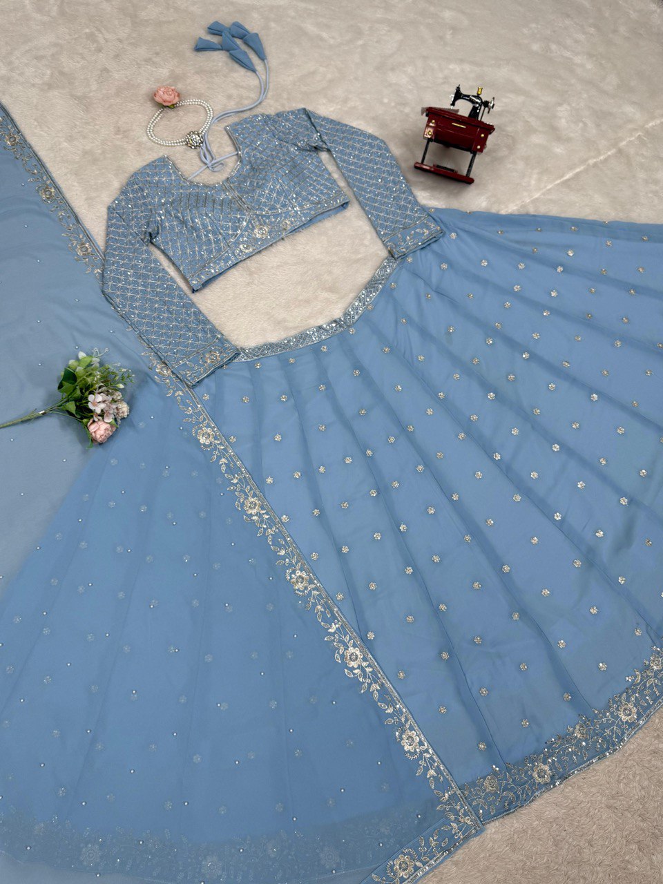 Astonishing Wedding Wear Blue Color Thread And Sequence Work Faux Georgette Lehenga Choli