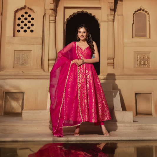 Captivating Festive Wear Rani Color Weaving Work Full Stitched Designer Jacquard Silk Anarkali Suit