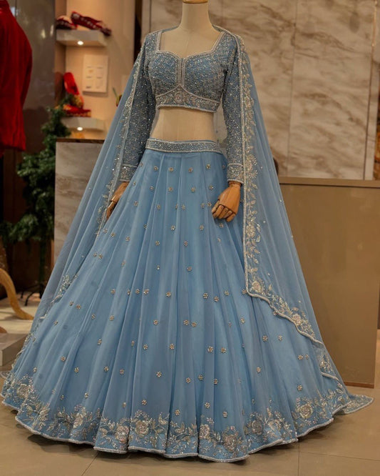 Astonishing Wedding Wear Blue Color Thread And Sequence Work Faux Georgette Lehenga Choli