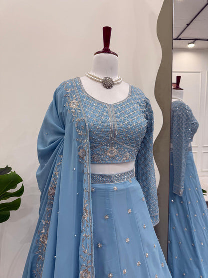 Astonishing Wedding Wear Blue Color Thread And Sequence Work Faux Georgette Lehenga Choli